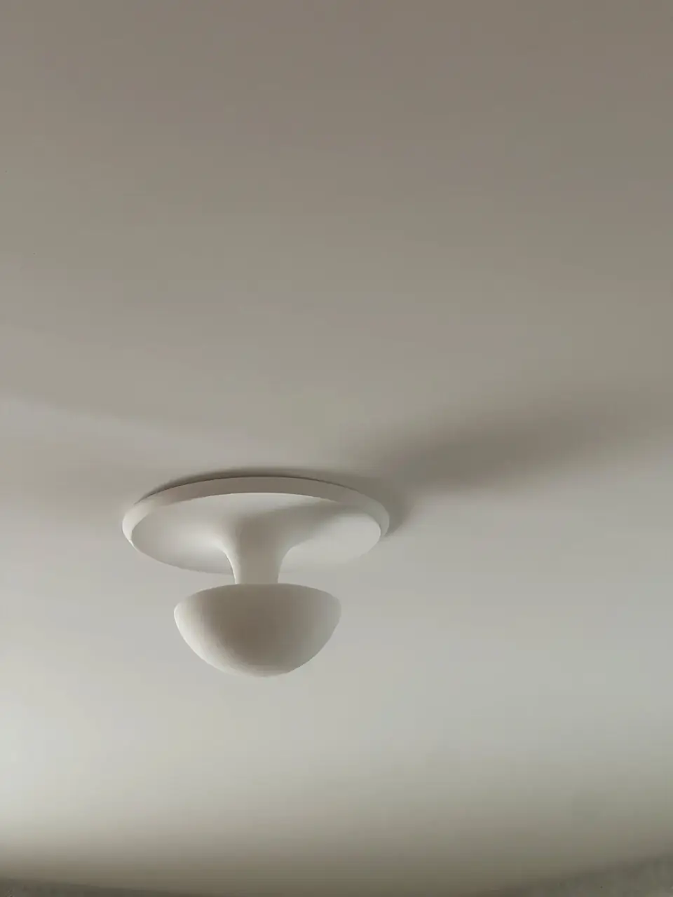 PLST 44 plaster flush mount by Brendan Tadler, installed, looking up at the ceiling